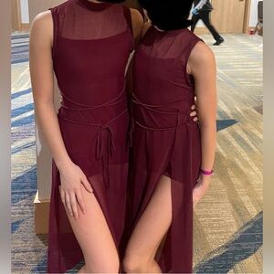 Burgundy two piece dance costume with tie and slits